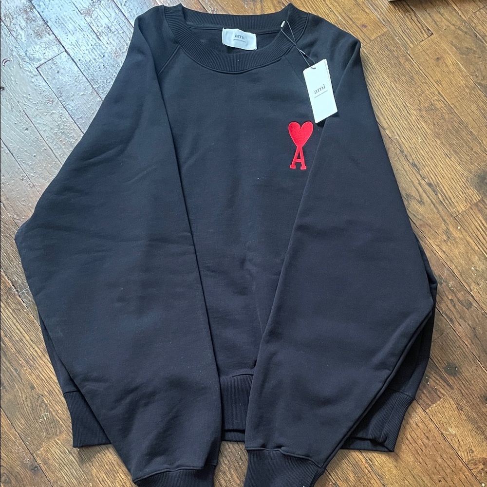 Ami Black Pullover with Red Heart Accent
